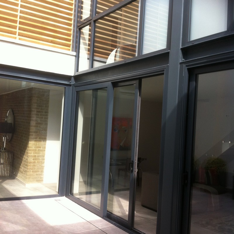 Anthracite aluminium sliding patio doors fitted in Hither Green