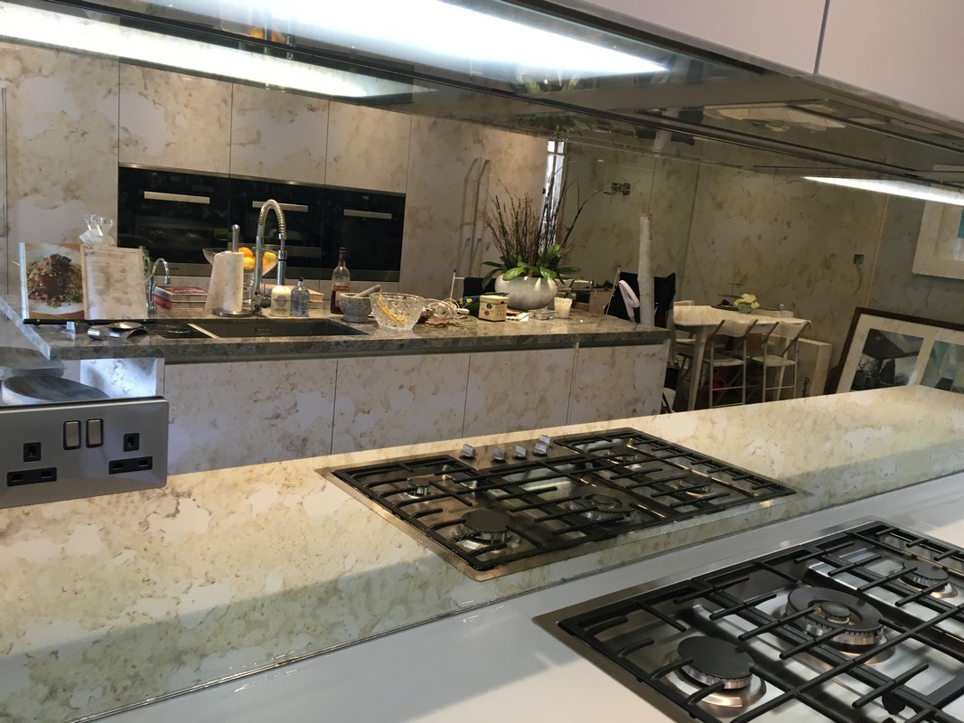 Mirror glass splashback in Hither Green luxury kitchen